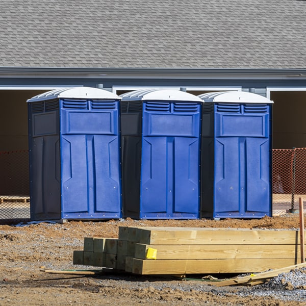 what is the cost difference between standard and deluxe portable toilet rentals in Sauquoit NY